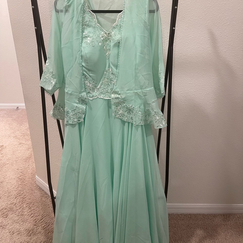 Elegant Mint Green Gown with Lace Details